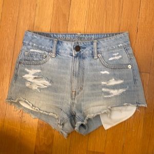 Distressed light wash denim shorts